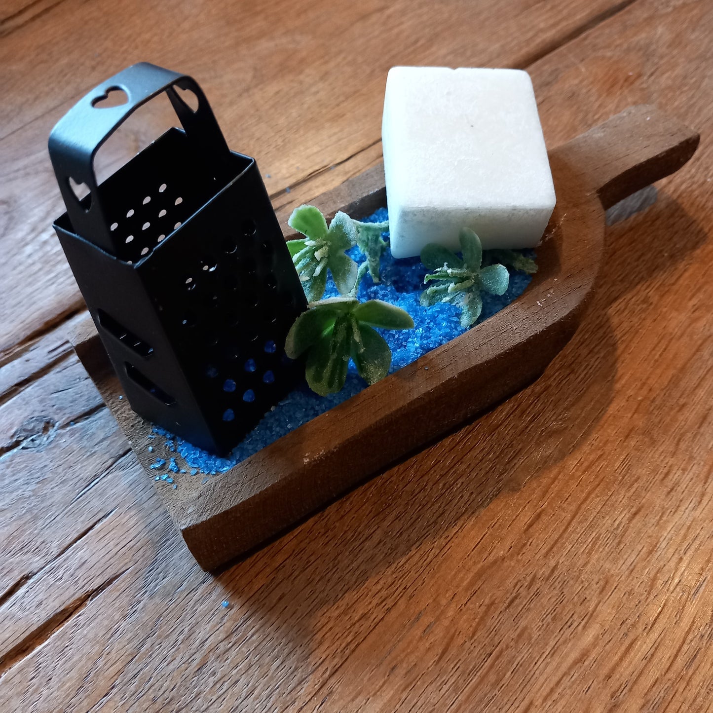 Houten schep voor amberblokjes